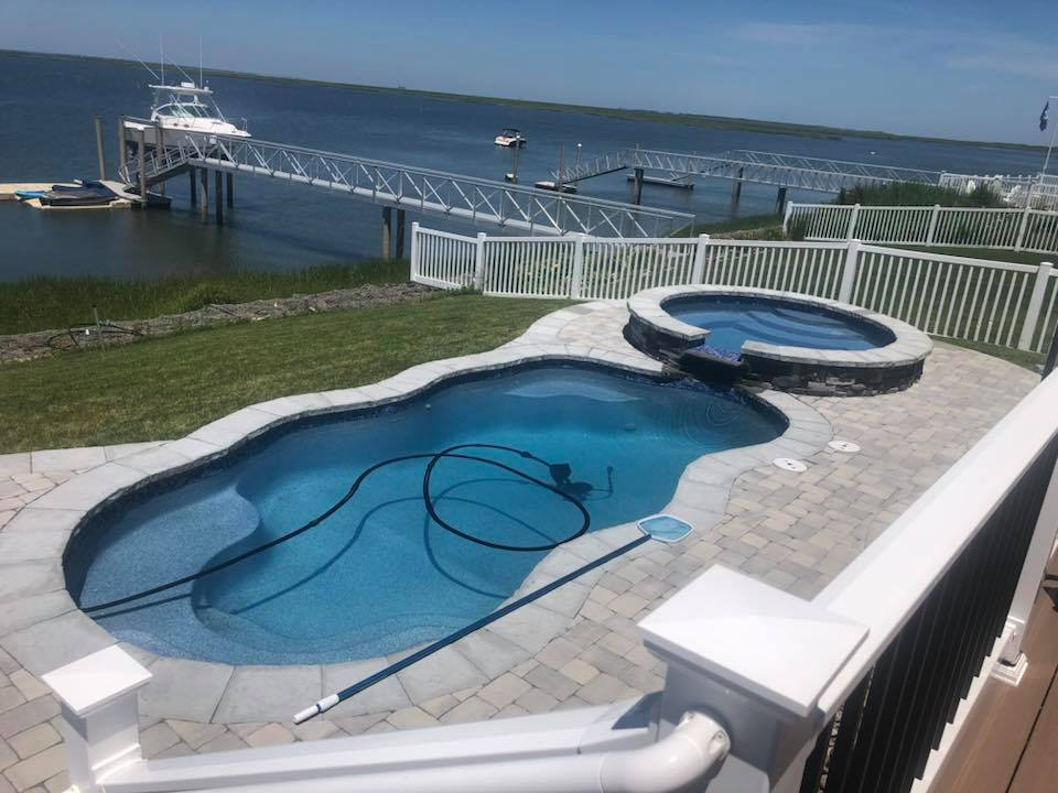 Company performing weekly maintenance on pool in Margate, NJ
